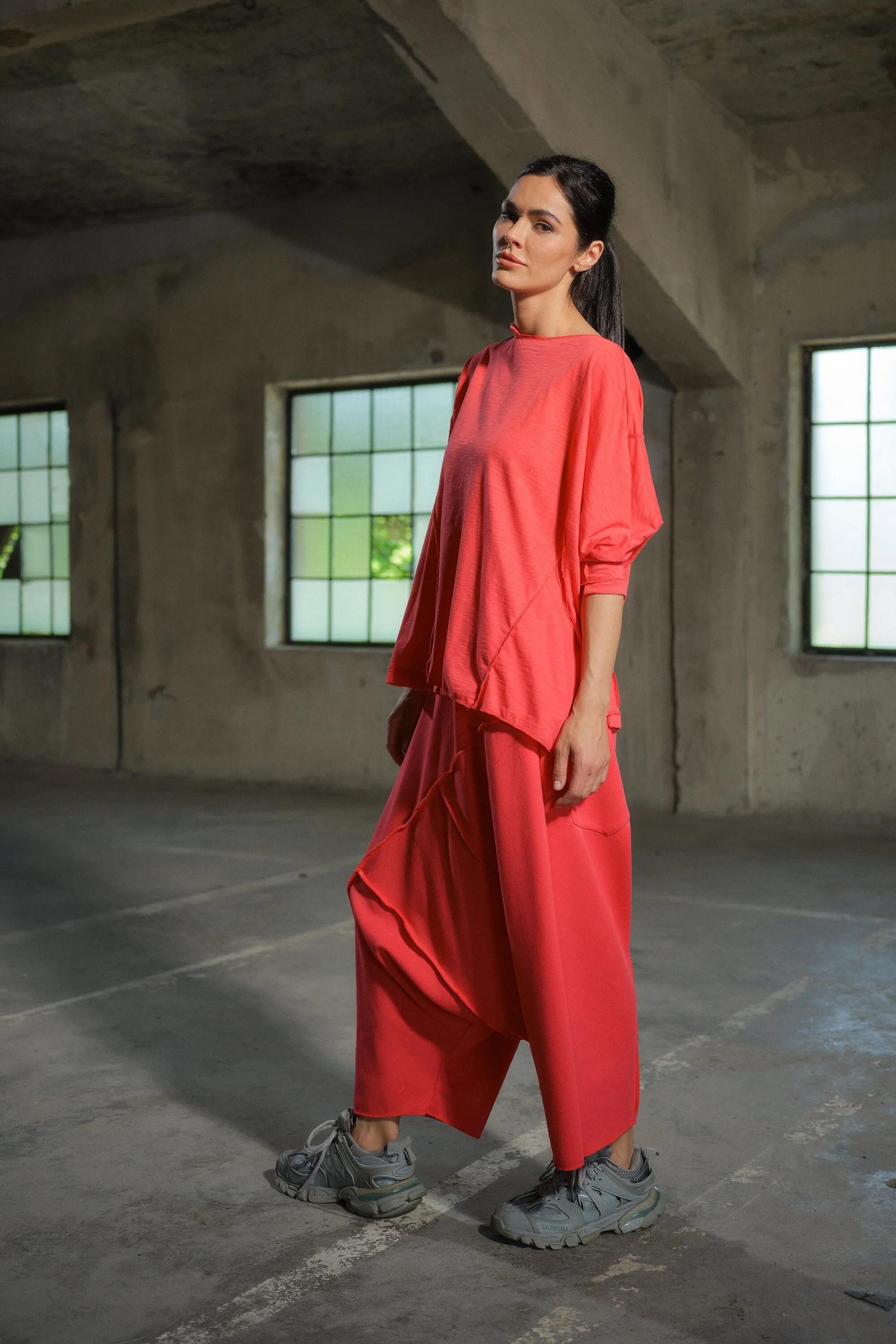 Avant garde drop crotch cotton pants with asymetrical seams