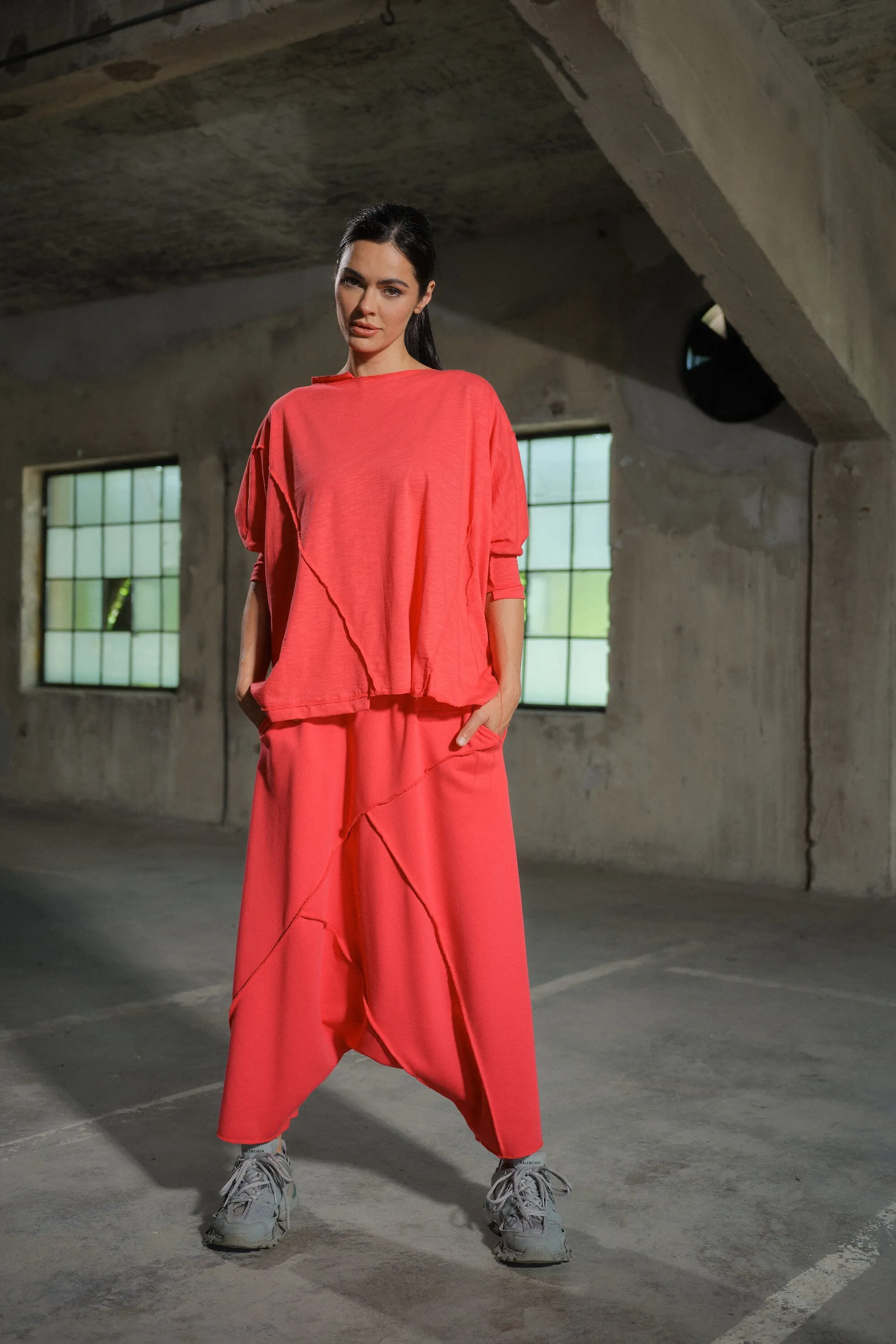 Avant garde drop crotch cotton pants with asymetrical seams