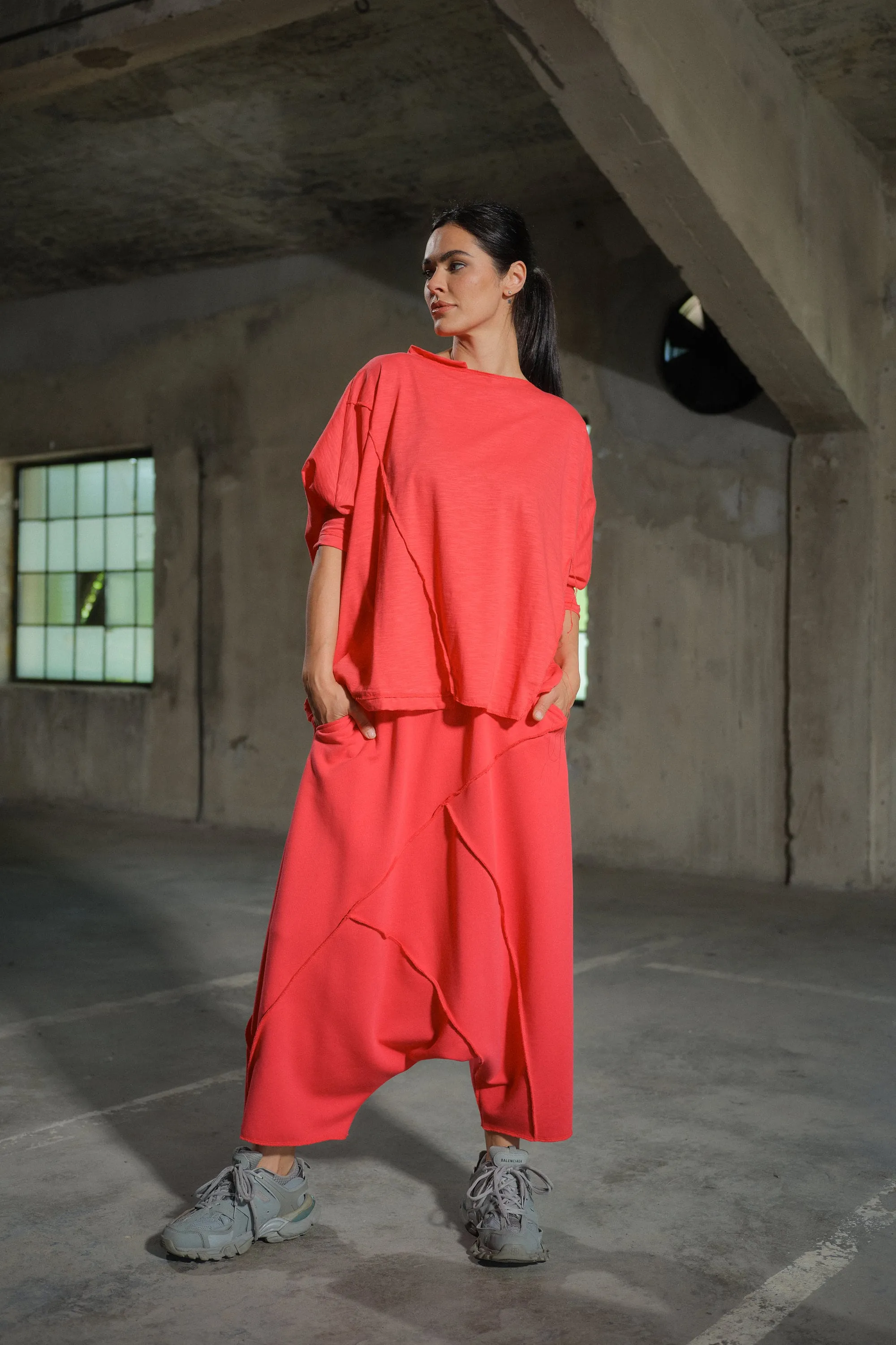 Avant garde drop crotch cotton pants with asymetrical seams