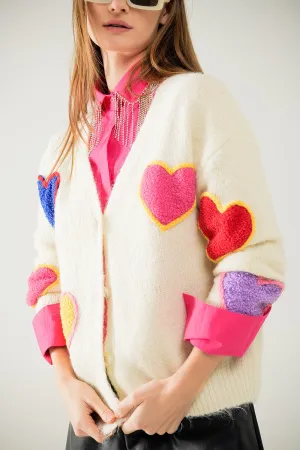 Beige knitted cardigan with embroidered hearts