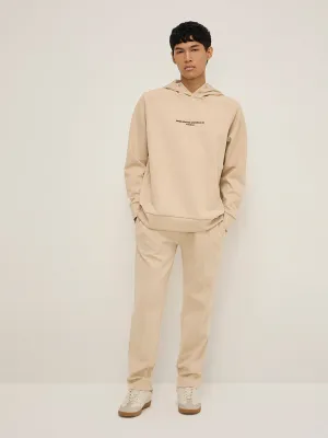 Studiofit Beige Relaxed-Fit Mid-Rise Track Pants